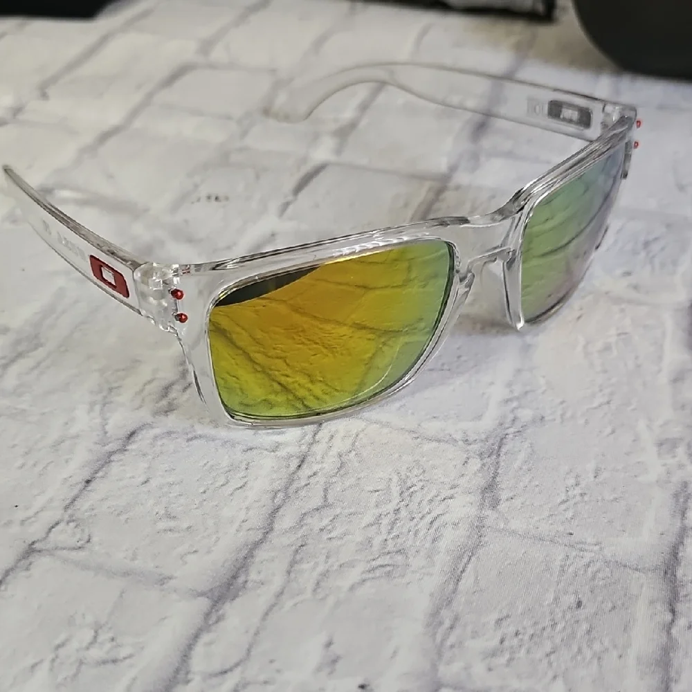Oakley Holbrooks in a clear / crystal frame with a Prizm-style mirrored lens. - Picture 2 of 6